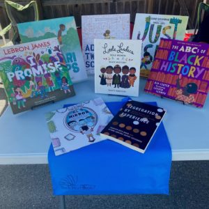 Eight children's books on table